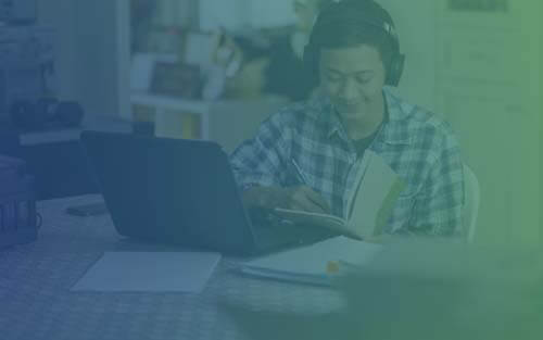 High school student studying at home.